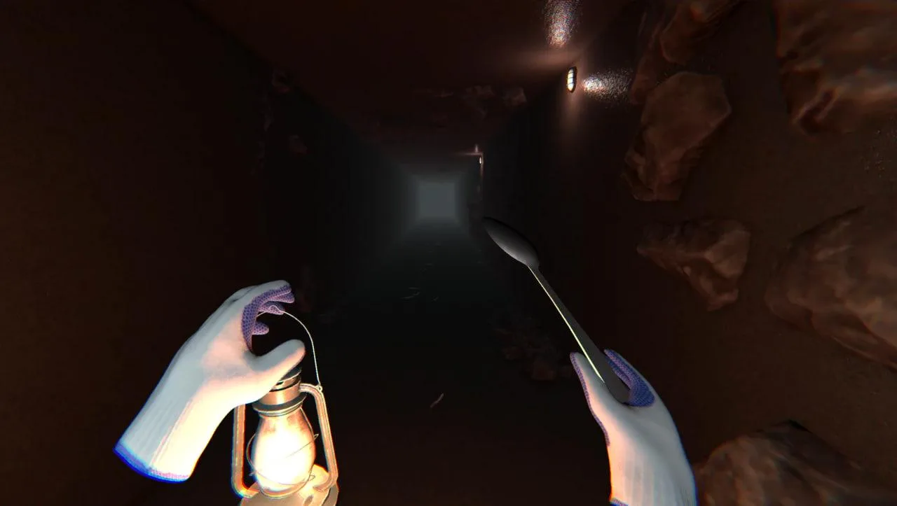 Prison Spoon Escape first-person view holding a lantern and spoon in a narrow tunnel